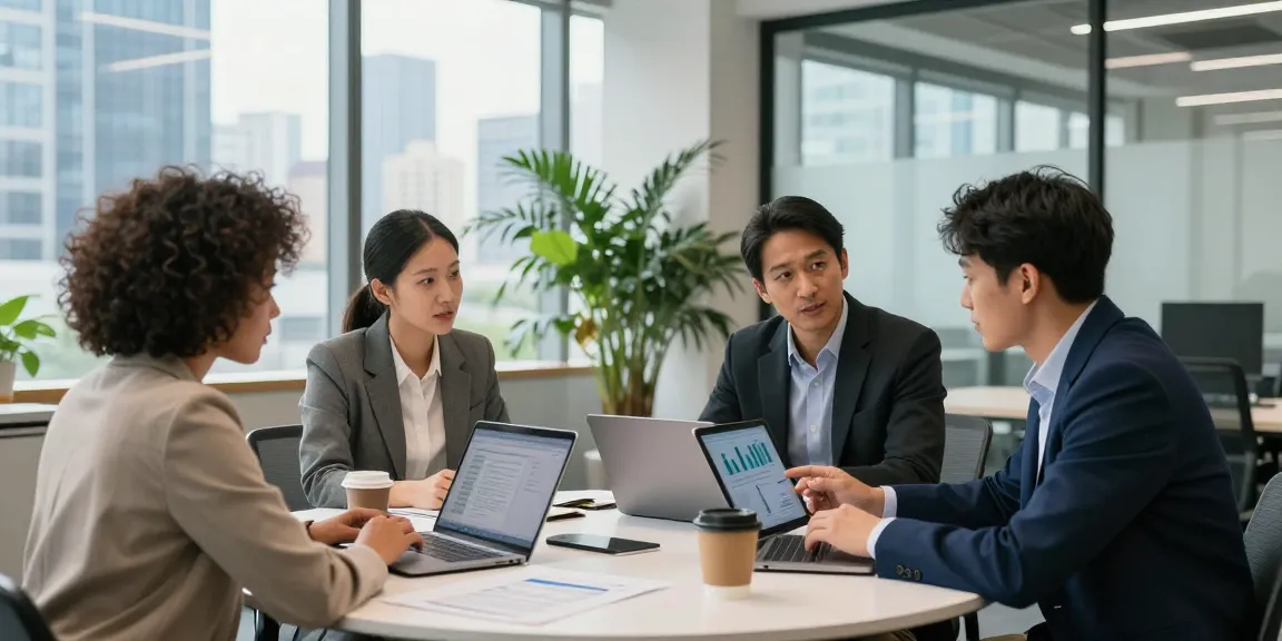 Team collaborating at https://factors.org.uk in modern office setting, showcasing innovative teamwork and engagement.