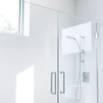 Showcasing stylish shower sliding doors in a modern bathroom for enhanced aesthetics and functionality.