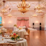 Experience Wedding Event Space Jacksonville with an elegant venue featuring floral decor and chandeliers.